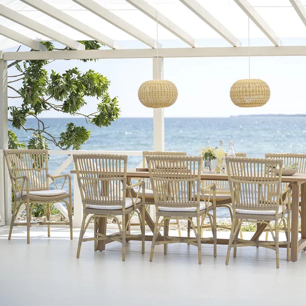 Piano armchair in synthetic rattan