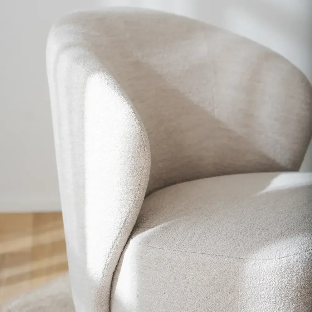 Roselawn swivel armchair in light beige