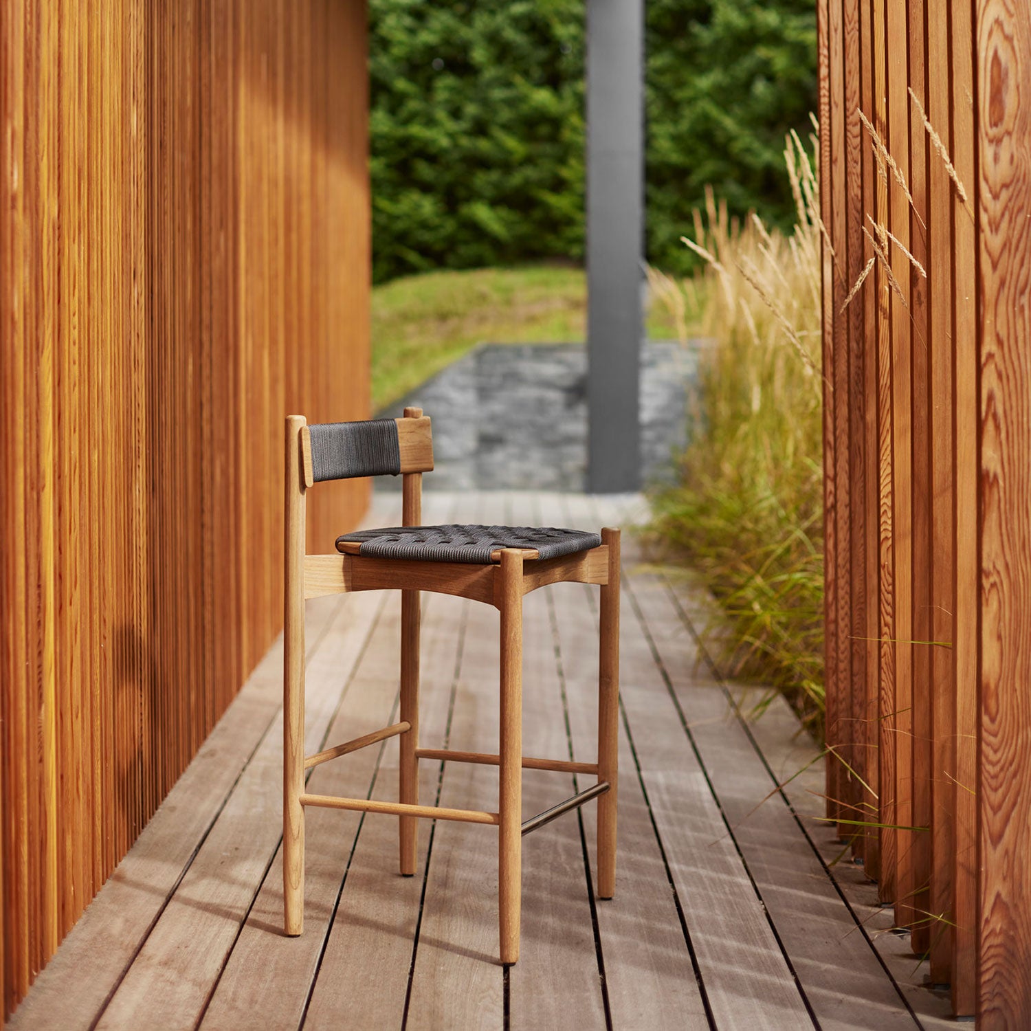 Koster teak bar stool