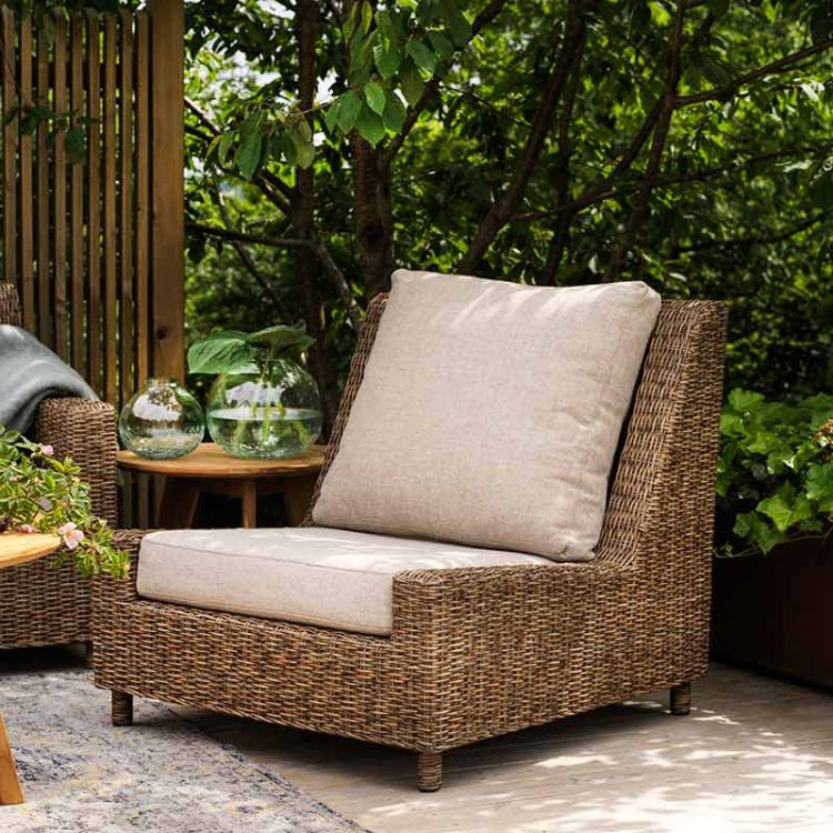 Sandkorn lounge armchair natural rattan