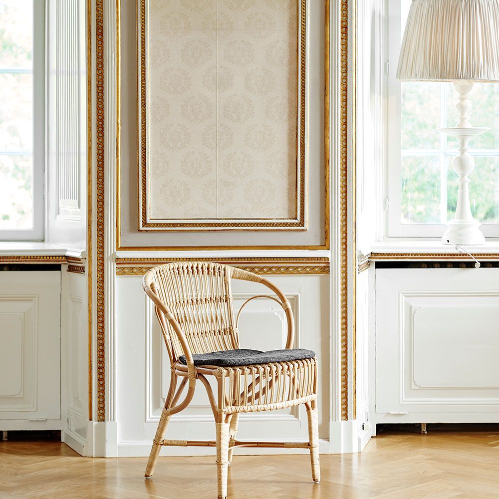 Robert rattan chair Antique
