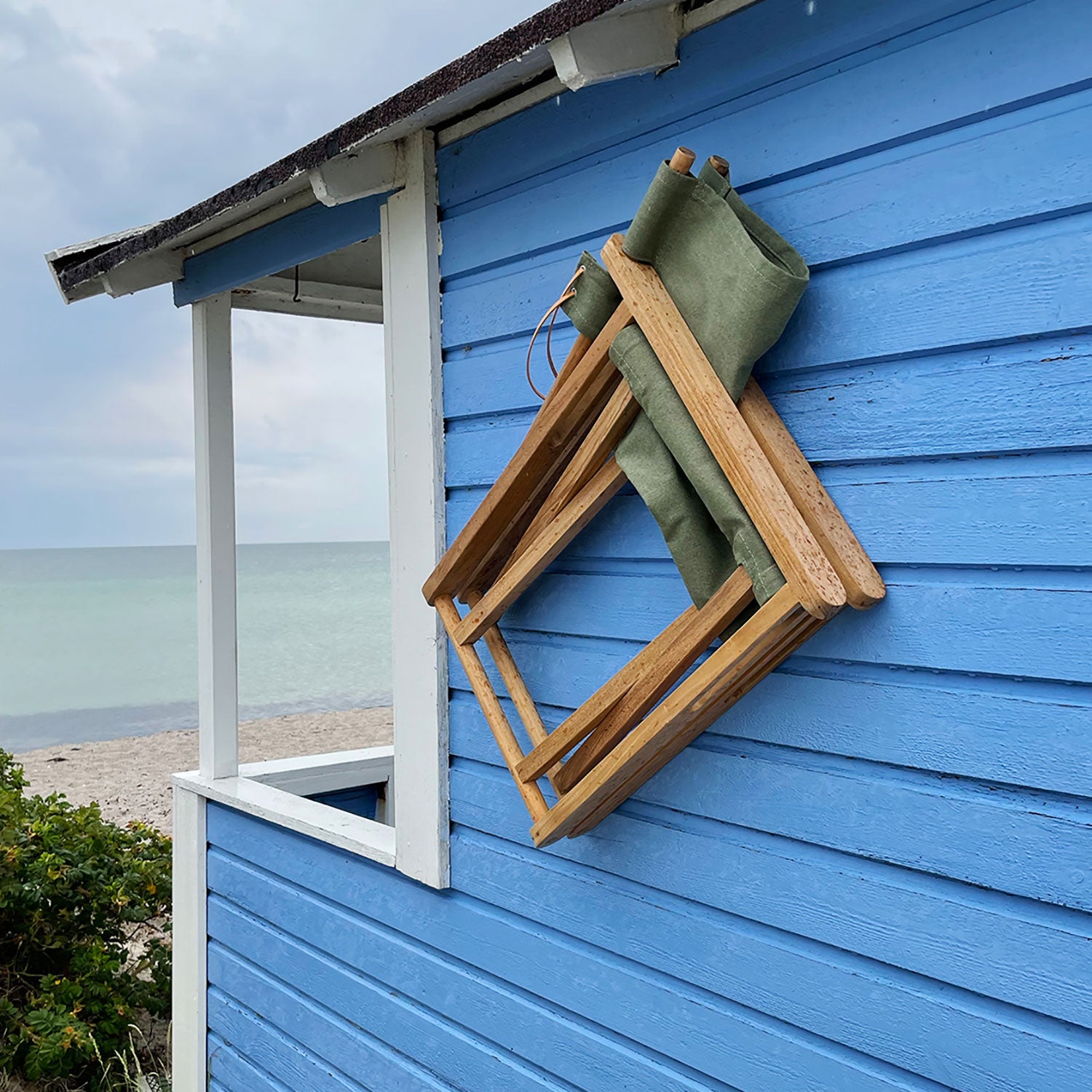 Kryss lounge armchair teak