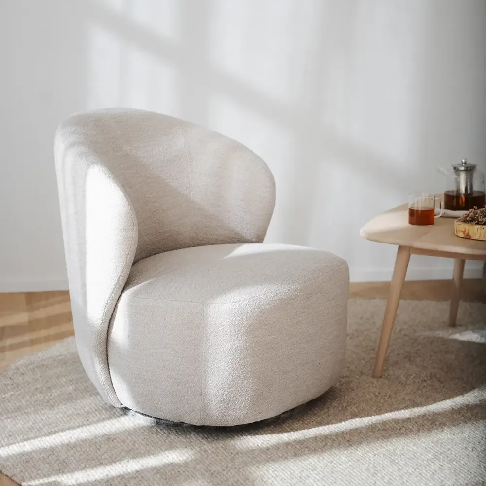 Roselawn swivel armchair in light beige