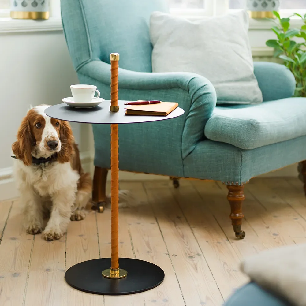 Cabaret side table Black leather, brass and steel