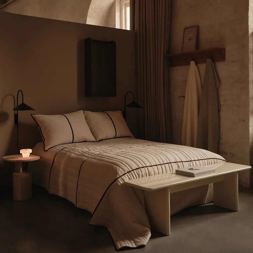 Quilted cushion in organic cotton Vari